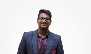 Dr. Amal Ravikumar — Director